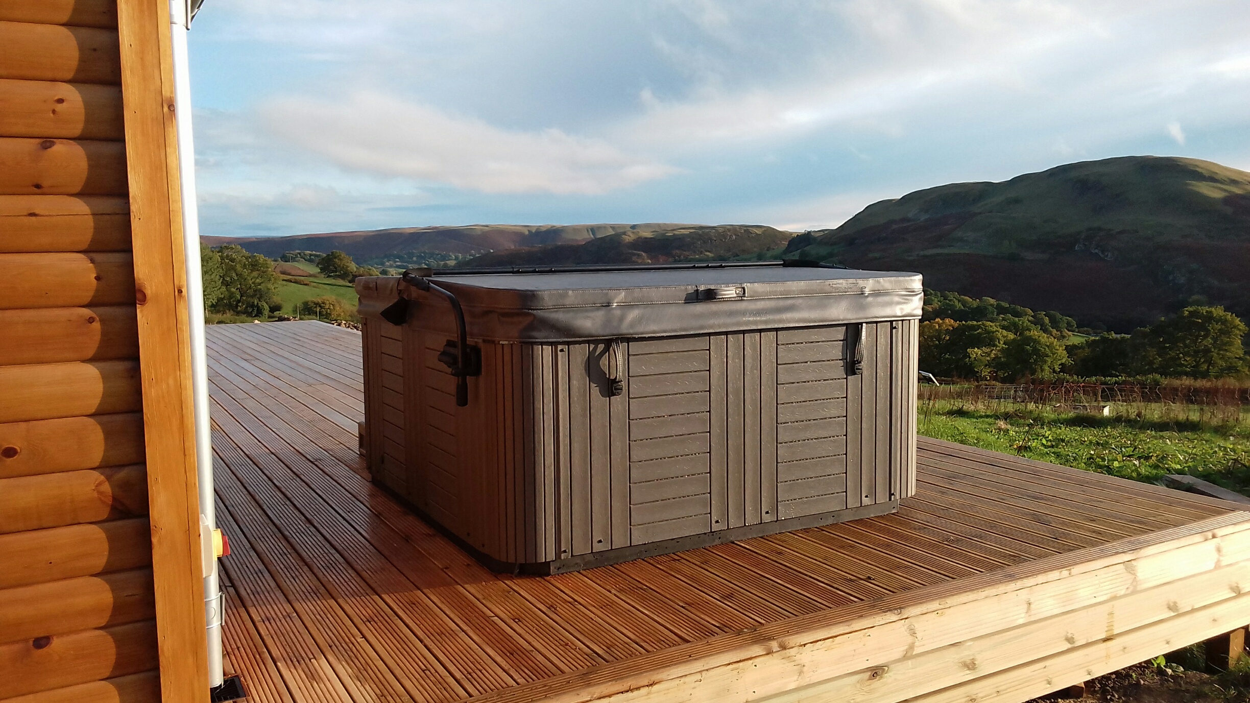 Marquis Spas Celebrity Broadway Hot Tub on a decking with cover closed