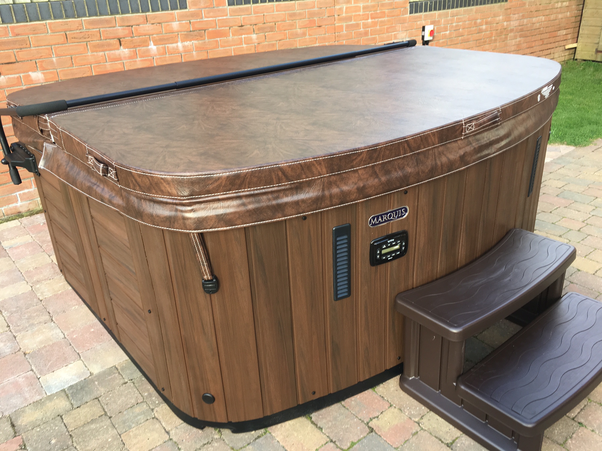 Marquis Spas Crown Resort Hot Tub with closed cover