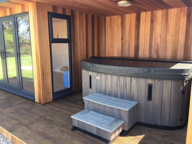 Marquis Spas Crown Spirit Hot Tub installed inside with cover closed