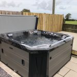 Marquis Spas V84L Hot Tub Midnight Canyon and Barnwood cabinet