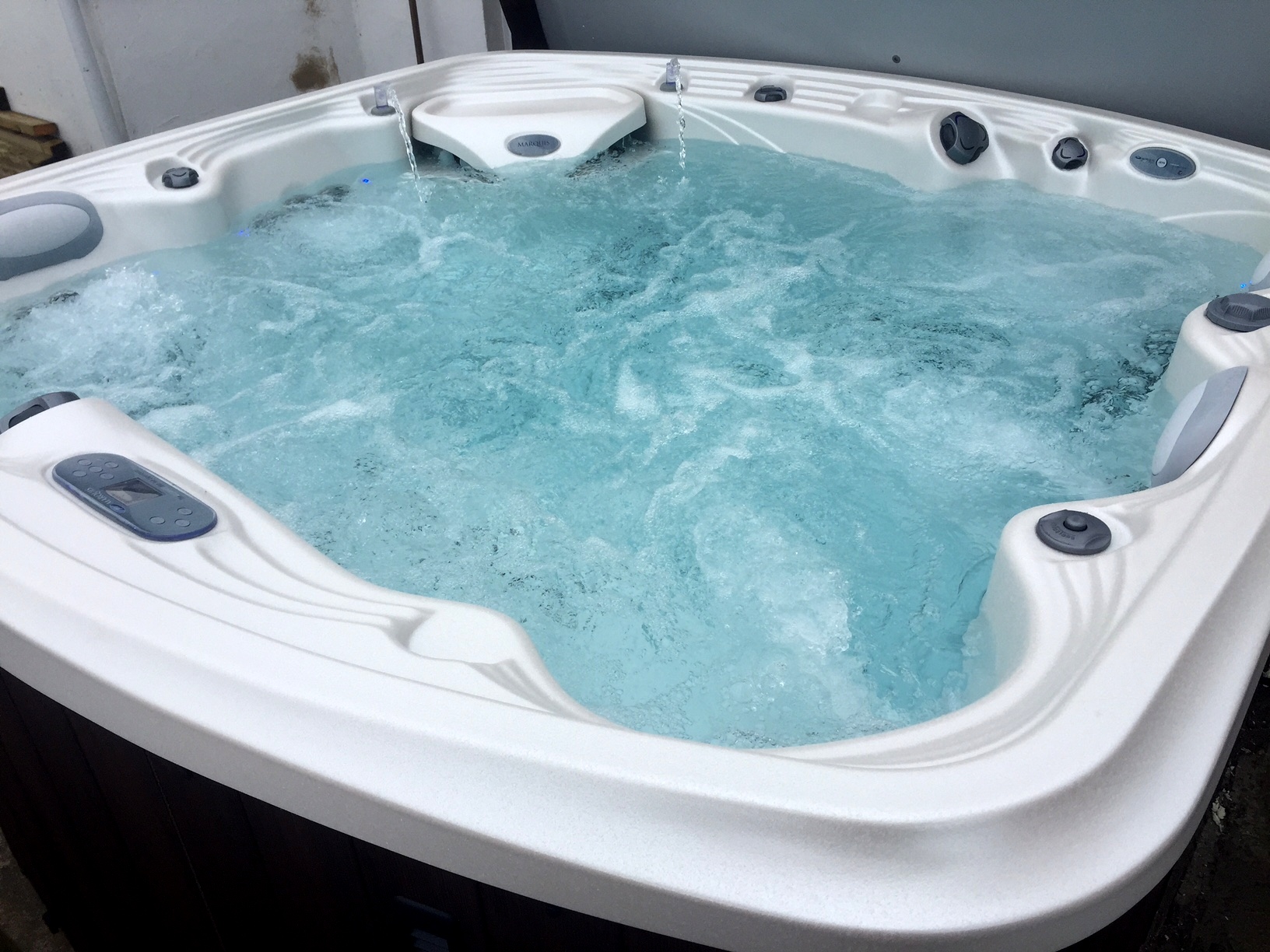 Marquis Spas Crown Euphoria Hot Tub close up image with jets on